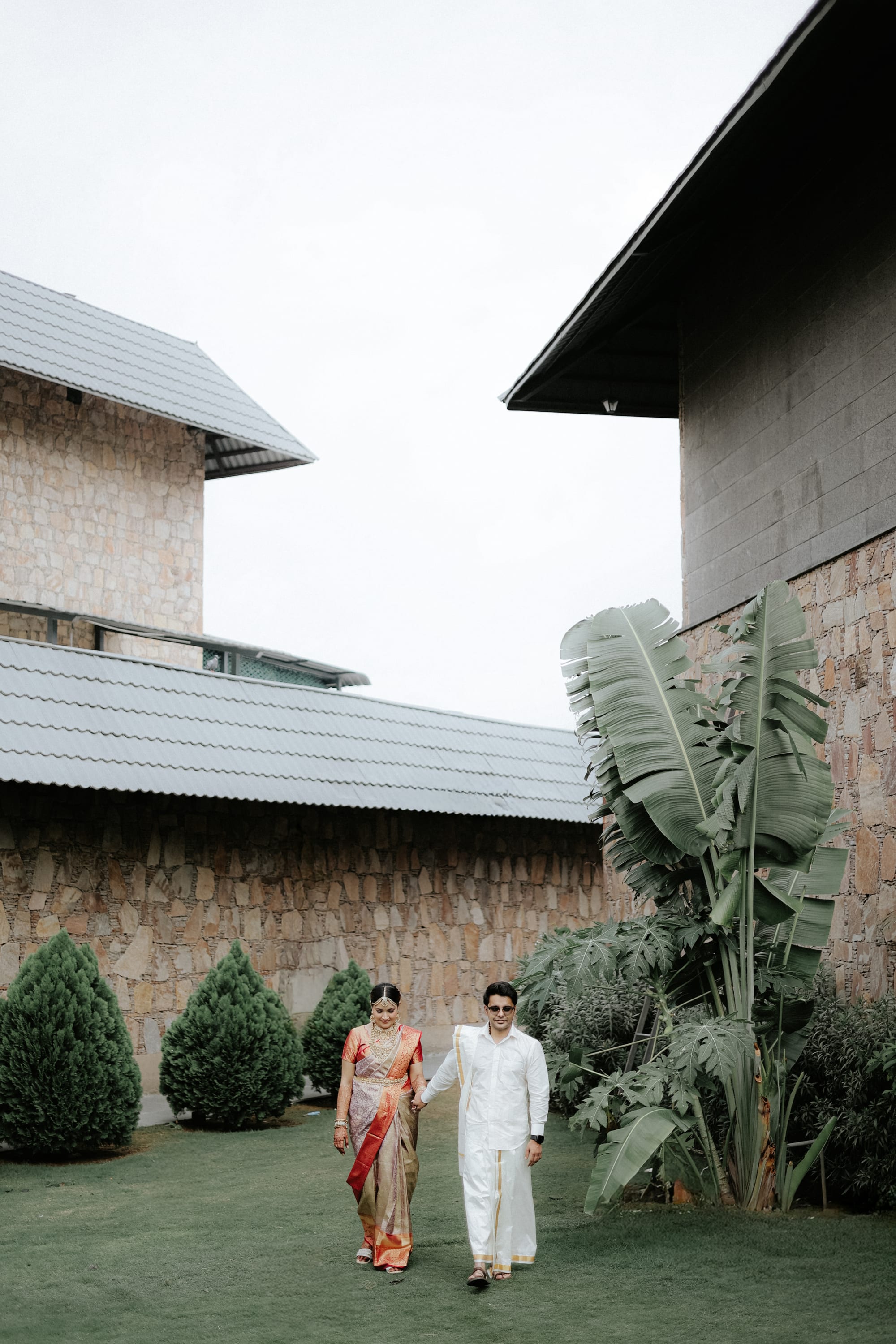 Bride in motion, tulle dress caught mid-turn